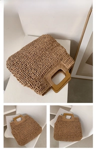 Close-up of khaki straw beach tote featuring a woven hollow pattern and square wooden handles