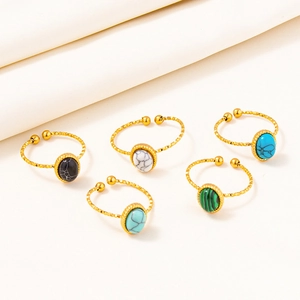 Five pieces of adjustable 304 stainless steel gold rings with various marble textures
