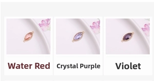Macro detail of marquise crystal connectors in pink and purple for DIY jewelry making