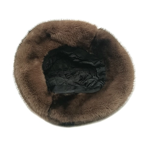 Detail view of winter faux fur bucket hat with warm quilted lining and adjustable drawstring