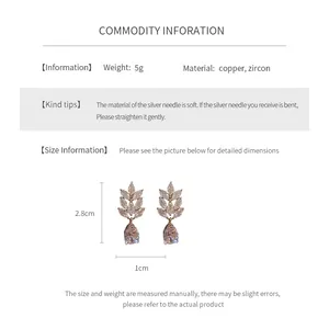 Detailed view of silver needle zircon drop earrings with wheat ear design, 2.8cm height