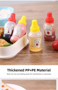 Detailed set of 4 mini squeeze sauce bottles for salad and ketchup in a bento lunch box
