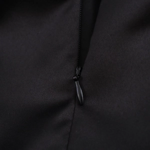 French style black bubble mini skirt featuring a hidden zipper and woven texture