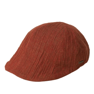 Retro linen pleated flat cap in rust red with a stylish side metal tag for women