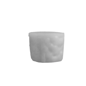 White cylindrical waffle candle with textured cloud patterns on a clean white background