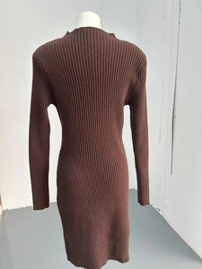 Detail view of long sleeve mock neck knit dress with vertical ribbed texture in coffee brown