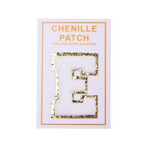 Detail of chenille letter E patch with gold glitter edge and peel-and-stick adhesive