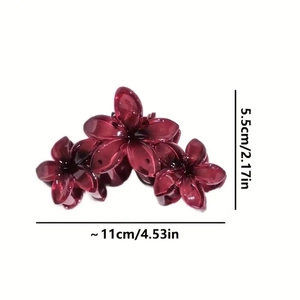 Detail view of burgundy flower hair claw clip dimensions measuring 11cm by 5.5cm