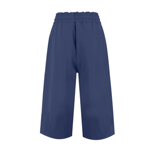 Detailed view of dark blue high-waisted linen pants with elastic waist and tie cord