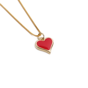 Gold plated copper necklace with a red heart-shaped evil eye pendant on a box chain
