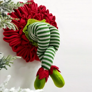 Christmas elf legs wreath with red fabric and green striped stockings for tree decor