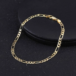 Elegant 3.3mm 925 sterling silver gold Figaro chain bracelet on professional black stand