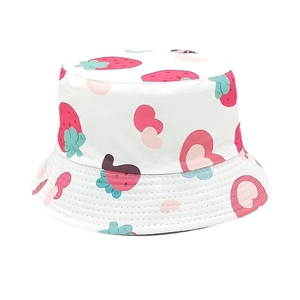 Close-up of strawberry and heart patterns on breathable white cotton sun hat with stitching
