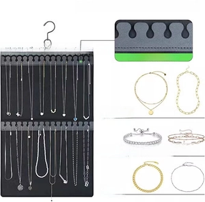 Detail of felt jewelry organizer featuring sturdy PU leather slots and metal hanging hook