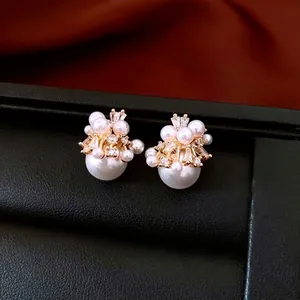 Elegant 18K gold plated pearl cluster stud earrings with sparkling cubic zirconia accents
