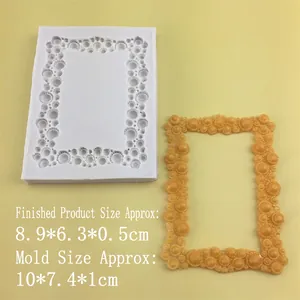 Detail view of oval silicone mold with finished gold relief frame showing precise dimensions