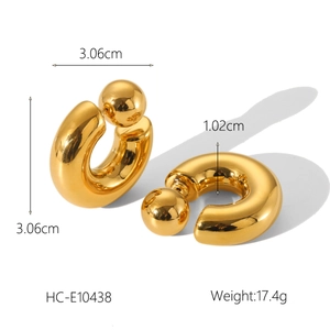 Detail view of gold stainless steel C-shaped ball earrings with precise size measurements