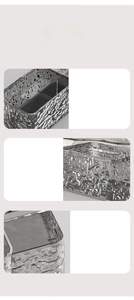 Macro detail of glacier-textured tissue box showing smooth wide opening and non-slip base