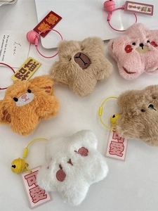 Plush bear head star charms with colorful bells and embroidery on white background