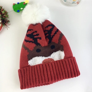 Détails du bonnet de Noël rouge en tricot avec nez de renne pailleté et pompon