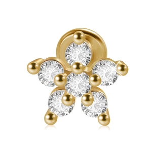 Golden flower labret stud with a central diamond and surrounding gems on white background