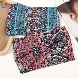 Detail of bohemian wide headbands with paisley patterns and a stylish knotted bow design
