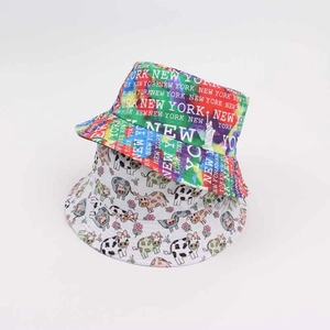 Detail showing graffiti prints and New York lettering on reversible bucket hats