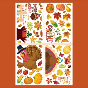 Detail view of Thanksgiving window clings with turkey, pumpkin and colorful autumn leaf patterns