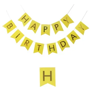 Yellow Happy Birthday banner with gold foil swallowtail flags and white string