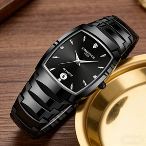 Detail view of quartz watch showing date display window and diamond hour markers