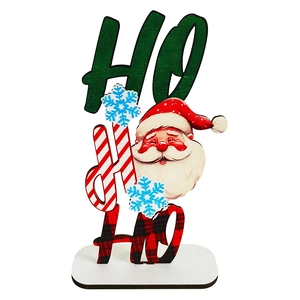 Close-up of wooden HO HO HO Christmas tabletop sign with Santa Claus and snowflake detail