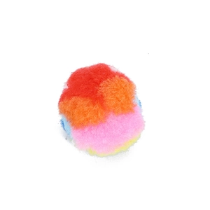 Detail shot of a soft plush rainbow pom-pom cat toy with vibrant multi-colored panels