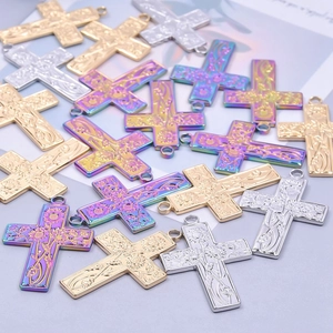 18k gold and silver stainless steel cross pendants with embossed floral patterns