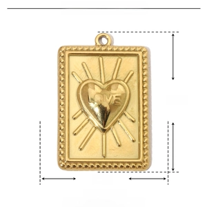 Detail view of gold stainless steel love heart pendant with 27mm by 18mm dimensions