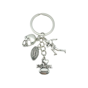 Antique silver football keychain with helmet, player and ball charms for fans