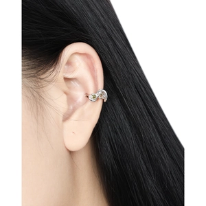 Irregular silver-plated ear cuff with sparkling green zirconia crystals for women