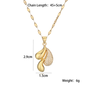 Detail of 18K gold plated necklace featuring triple teardrop pendants with pavé zircons
