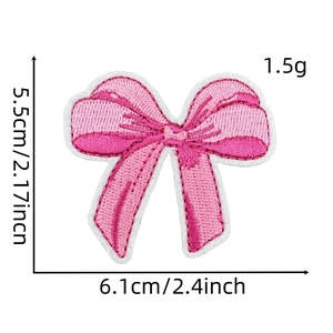 Detailed view of pink bow embroidery patch showing precise dimensions 6.1cm by 5.5cm