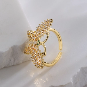 18K gold plated copper butterfly open ring with zircon inlay on marble display base