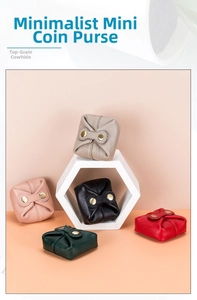 Five assorted colors of mini cowhide leather coin purses with golden snap buttons