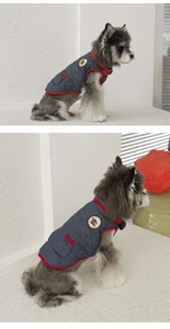 Detail view of quilted denim pet vest with red trim and bear logo patch for small dogs