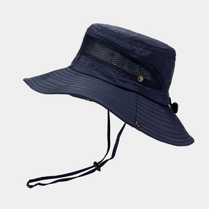 Detail view of navy blue outdoor sun hat with large mesh panels and adjustable chin strap