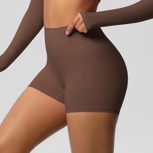 Side view of high-waist brown yoga shorts showing butt-lifting and tummy control fit