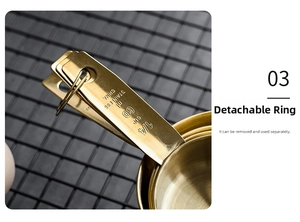 Detail of 1/4 Cup 60ml gold stainless steel measuring spoon with engraved capacity markings
