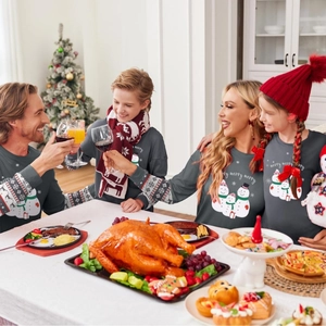 Family matching Christmas pajamas with charcoal grey snowmen sweaters for festive holiday wear