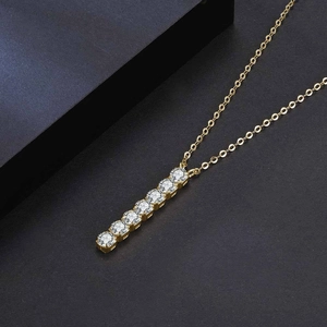 Elegant gold necklace with vertical seven-stone zircon pendant on O-chain for women