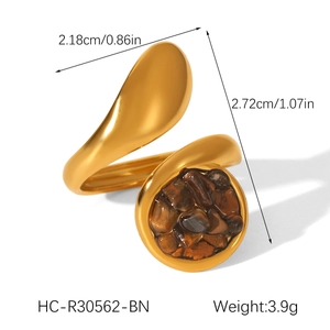 Detailed view of vintage gold-plated ring with tiger eye stone, size and weight specs