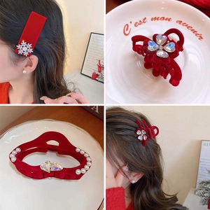 Elegant red velvet hair clips set with rhinestones and pearls shown on model and product views