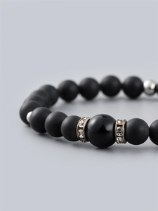 Men's matte black stone beaded bracelet with rhinestone spacers and glossy center bead