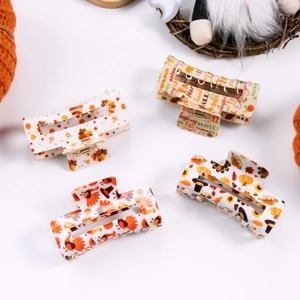 Set of four Thanksgiving hair claws with pumpkin, turkey, and autumn floral prints
